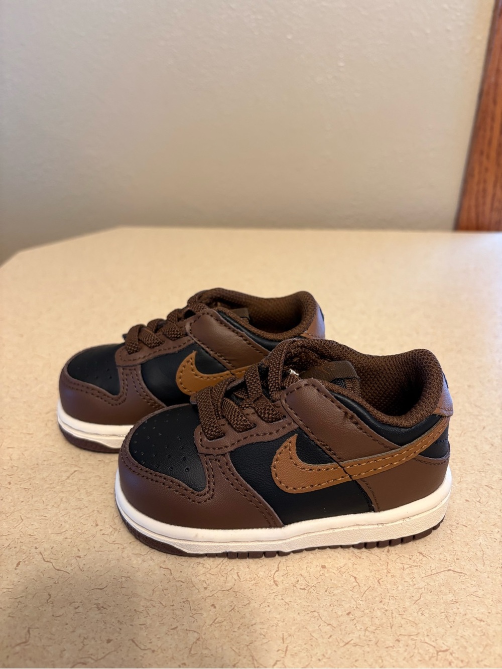 Nike Kids Brown and Black Low-Top Sneakers with Tan Swoosh
